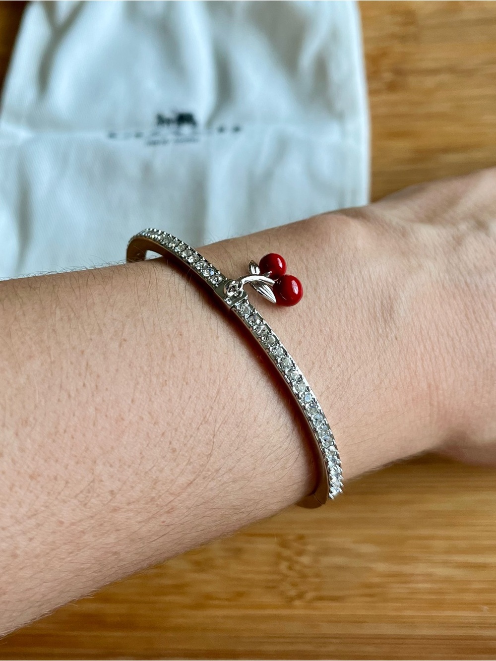 Coach Silver Tone Pave Bangle Bracelet w/ red Cherry / Cherries Charm & dust bag